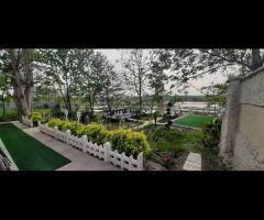 فروش ویلا باغ 780 متری با بنا 130 متری دوبلکس در روستای تمچال آستانه